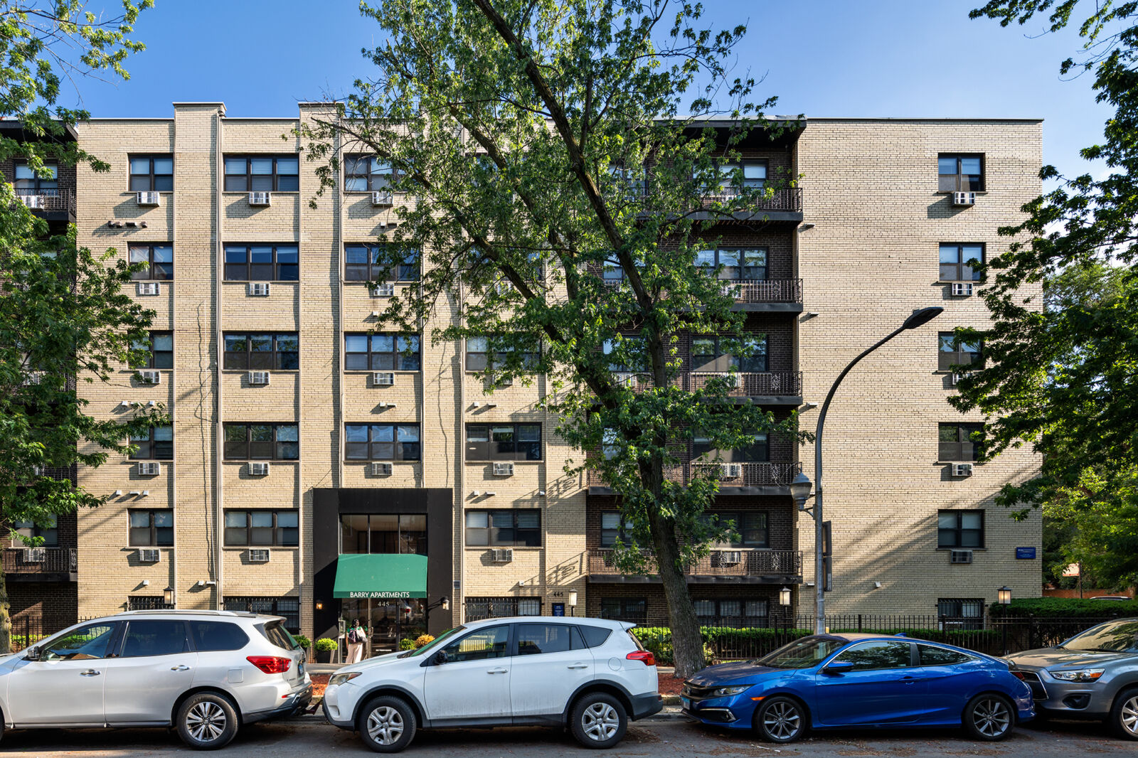 Full view of Barry Apartments at 445 W. Barry in Chicago’s Lakeview neighborhood, a mid-rise crea...