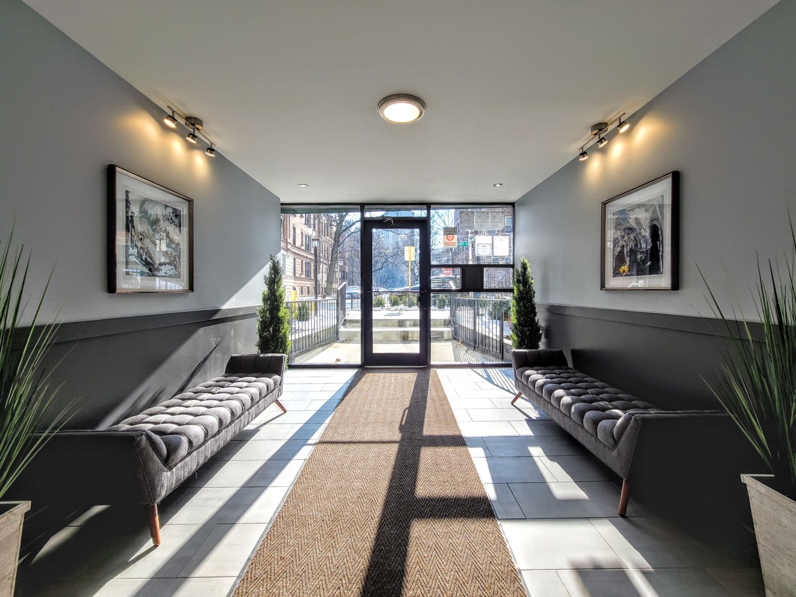Sunlight floods the front vestibule of 530 W. Surf in Chicago’s Lakeview neighborhood, showcasing...
