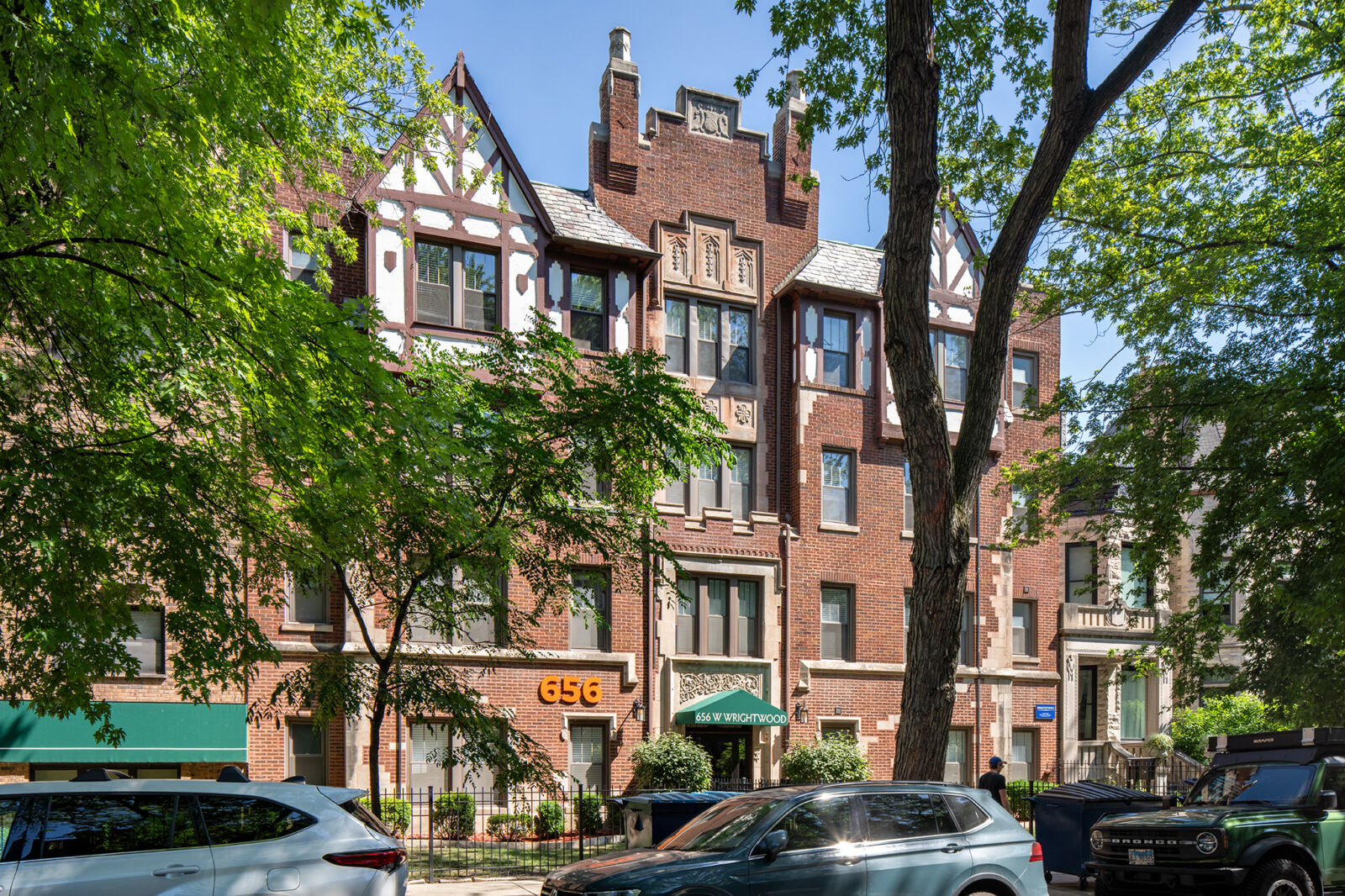 A four-story Tudor Revival-style apartment building at 656 West Wrightwood in Chicago’s Lincoln P...