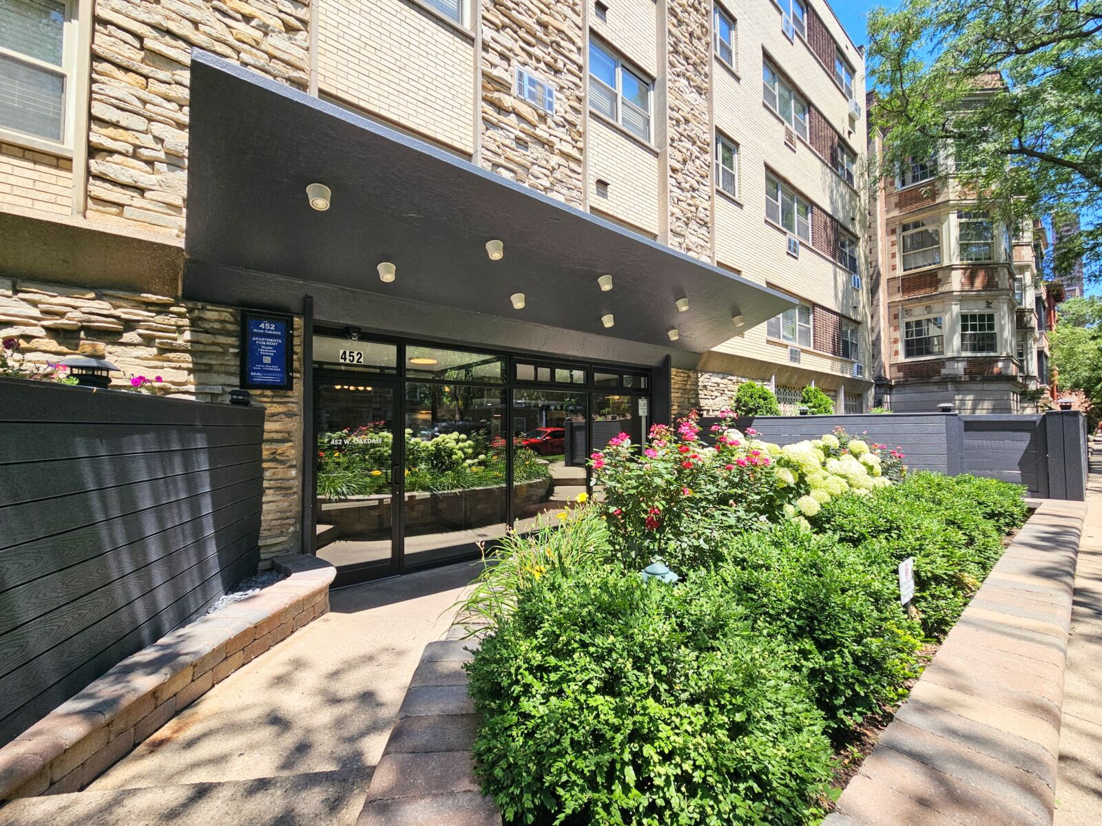 A mid-century modern apartment building at 452 West Oakdale in Chicago’s Lakeview neighborhood, w...