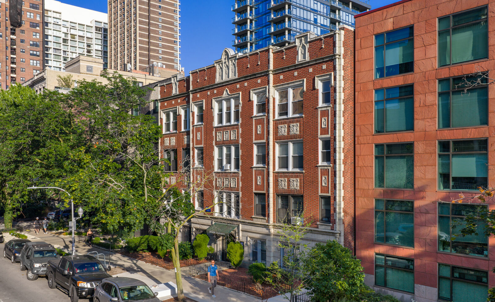 Charming vintage red brick apartment building at 511 W Melrose in Chicago’s Lakeview neighborhood...
