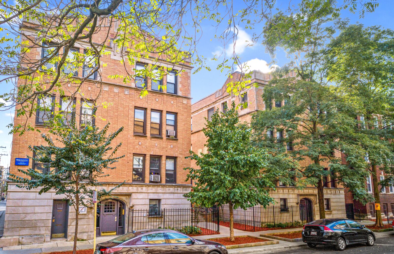 A three-story tan brick apartment building at 815 West Cornelia Avenue in Chicago’s Lakeview neig...