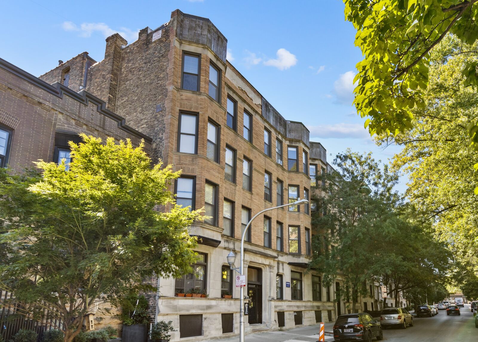 Elegant vintage apartment buildings at 639–647 W Oakdale in Chicago’s Lakeview neighborhood. The ...