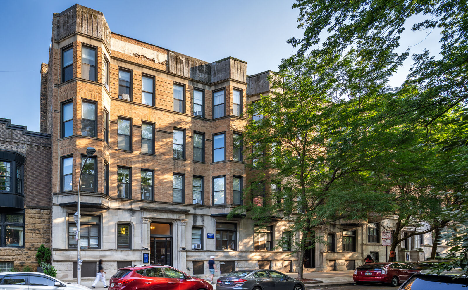 Elegant vintage apartment buildings at 639–647 W Oakdale in Chicago’s Lakeview neighborhood. The ...
