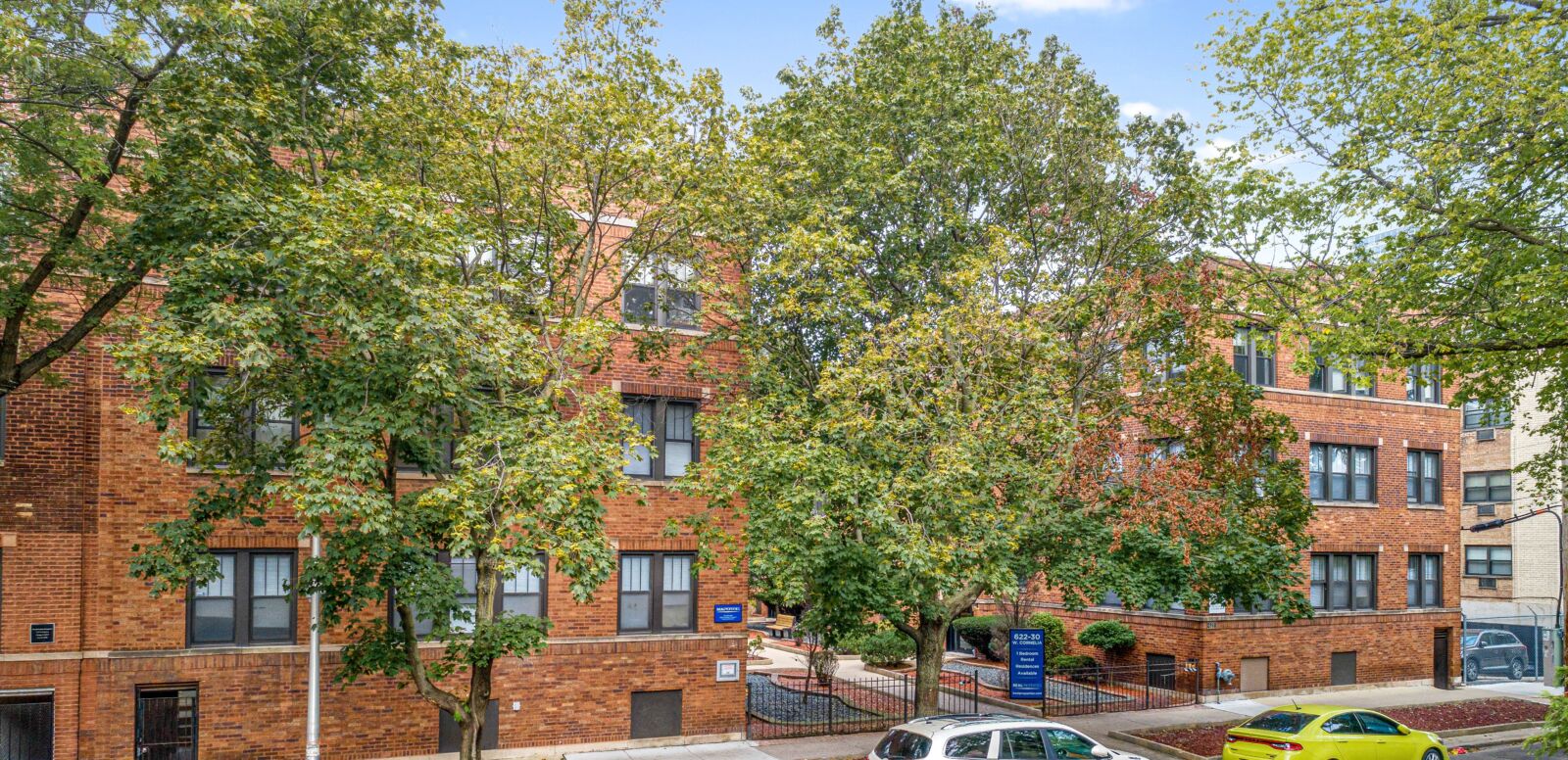 A three-story red brick apartment building at 622–630 West Cornelia Avenue in Chicago’s Lakeview ...